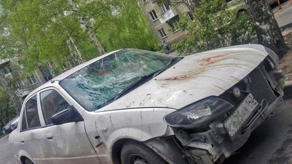 Новосибирцы нашли во дворе автомобиль в крови на кемеровских номерах
