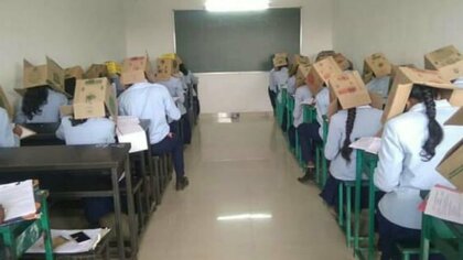 Индийские преподаватели заставили студентов сдавать экзамен с коробками на головах