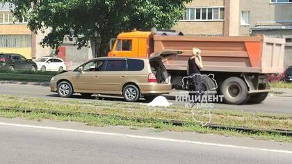 Женщина погибла под колесами автомобиля в Кемерове